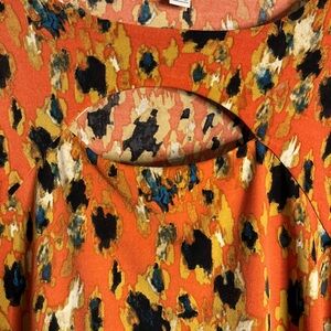 Price Drop 💥
Orange Print Blouse with Cut Out Detail 14/16W